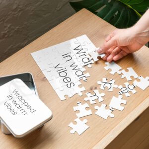 Jigsaw puzzle with tin